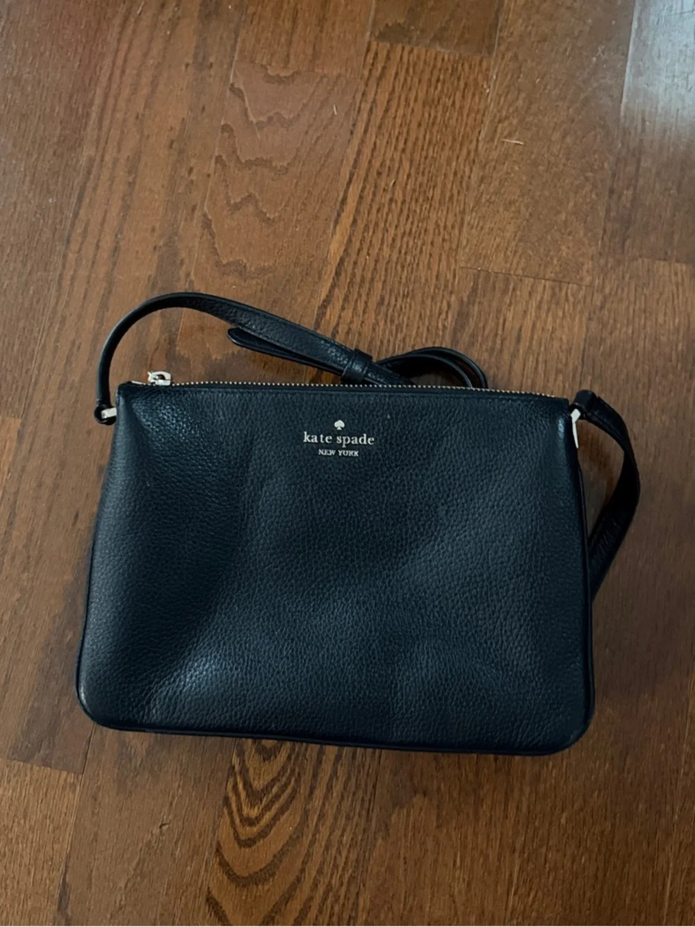 kate spade black pebbled leather crossbody with gold logo